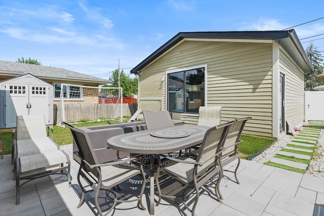 4944 Jarvis Ave, Skokie, IL 60077 - view of patio / terrace featuring outdoor dining space and an outbuilding
