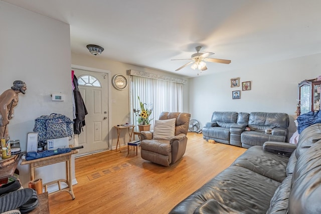 5228 W 54th St, Chicago, IL 60638 - living room featuring ceiling fan and light wood-style floors