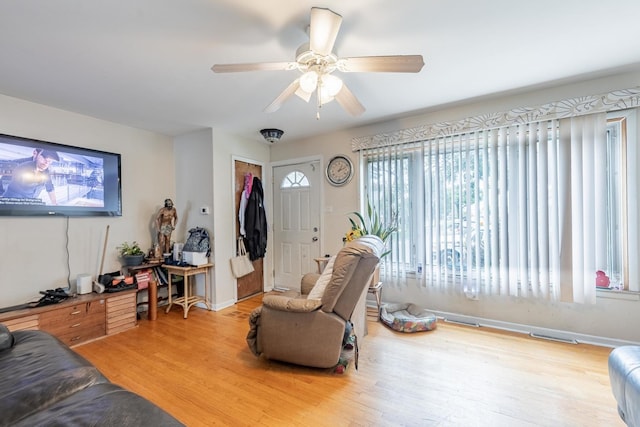 5228 W 54th St, Chicago, IL 60638 - living area with light wood-style flooring and a ceiling fan