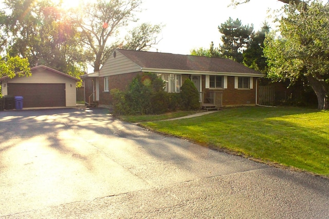 7926 S 83rd Ct, Justice, IL 60458 - single story home with an outbuilding, a garage, a front yard, and brick siding