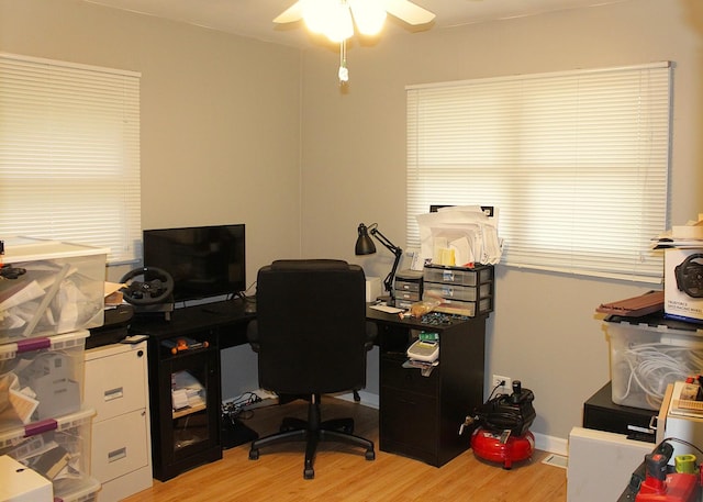 7926 S 83rd Ct, Justice, IL 60458 - home office with a ceiling fan and light wood-style floors
