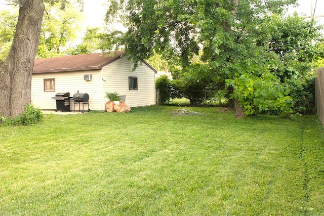 7926 S 83rd Ct, Justice, IL 60458 - view of yard featuring a wall mounted air conditioner