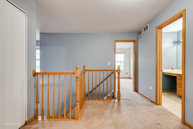 2517 Oak Tree Ln, Plainfield, IL 60586 - corridor featuring an upstairs landing and carpet floors