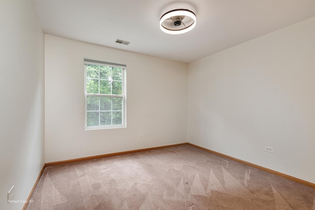 2517 Oak Tree Ln, Plainfield, IL 60586 - spare room featuring light colored carpet and baseboards