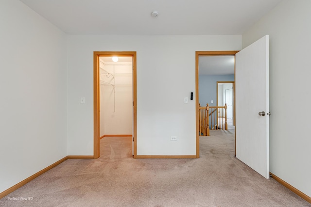 2517 Oak Tree Ln, Plainfield, IL 60586 - unfurnished bedroom with carpet floors and a spacious closet