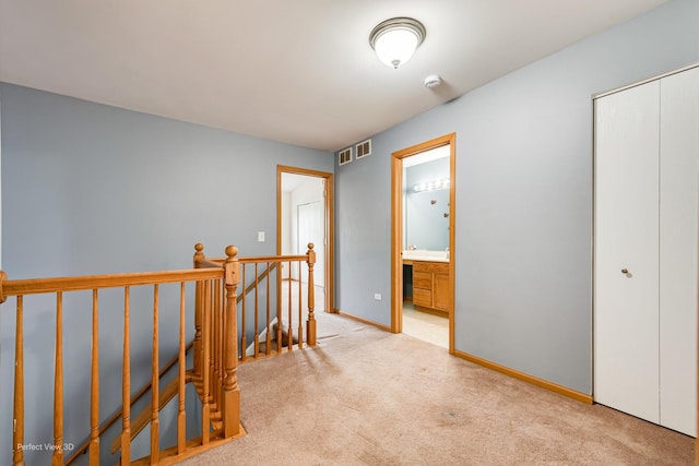 2517 Oak Tree Ln, Plainfield, IL 60586 - corridor with an upstairs landing and light carpet