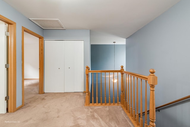 2517 Oak Tree Ln, Plainfield, IL 60586 - hallway featuring an upstairs landing, carpet, and attic access