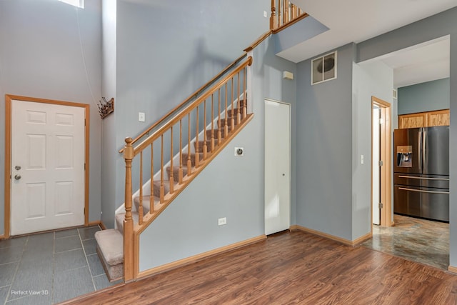 2517 Oak Tree Ln, Plainfield, IL 60586 - foyer entrance featuring stairs, wood finished floors, and a high ceiling