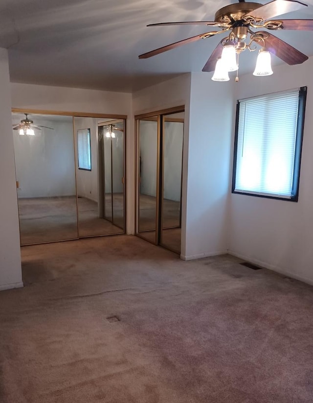 20137 Woodale St Unit 20137, Lynwood, IL 60411 - unfurnished bedroom with carpet flooring, multiple windows, and multiple closets