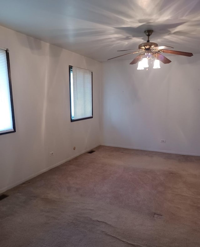 20137 Woodale St Unit 20137, Lynwood, IL 60411 - spare room featuring plenty of natural light, carpet floors, and a ceiling fan