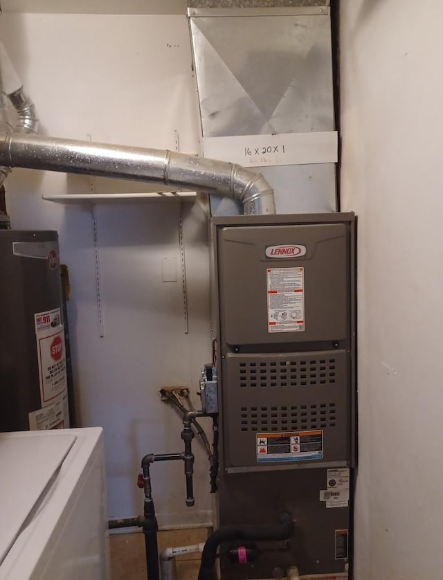 20137 Woodale St Unit 20137, Lynwood, IL 60411 - utility room featuring water heater and washer / dryer