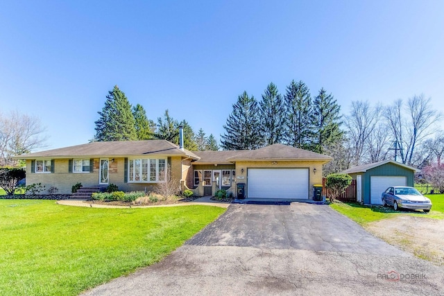 23W073 Dickens Ave, Glen Ellyn, IL 60137 - ranch-style house with a front yard, a garage, driveway, and brick siding