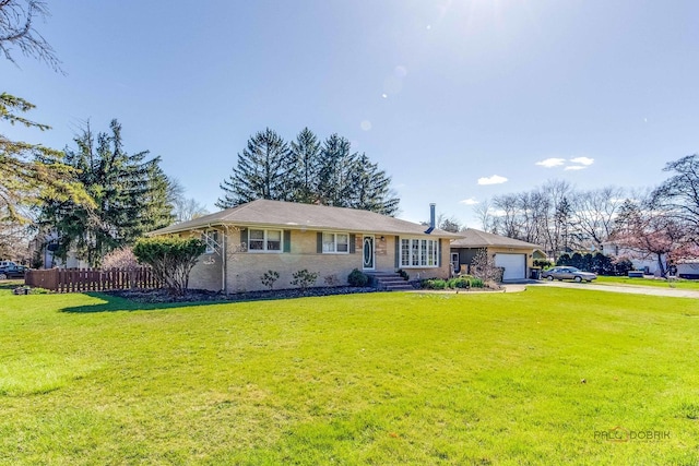 23W073 Dickens Ave, Glen Ellyn, IL 60137 - single story home with an attached garage, driveway, and brick siding