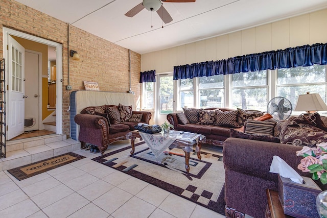 23W073 Dickens Ave, Glen Ellyn, IL 60137 - living room with light tile patterned flooring, ceiling fan, and brick wall