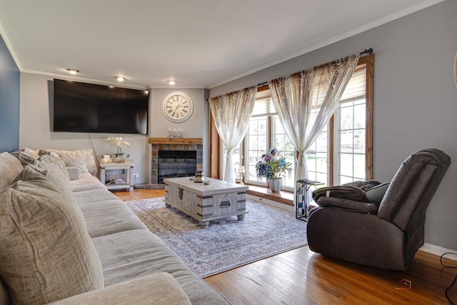 23W073 Dickens Ave, Glen Ellyn, IL 60137 - living area with ornamental molding, wood finished floors, and a tile fireplace