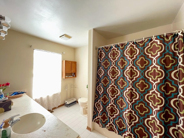 510 Orchards Pass, Bartlett, IL 60103 - bathroom featuring tile patterned flooring, vanity, and curtained shower