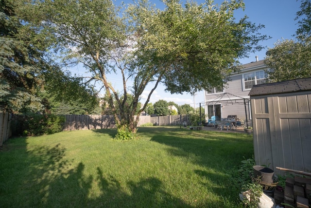 510 Orchards Pass, Bartlett, IL 60103 - fenced backyard featuring a storage shed and a patio