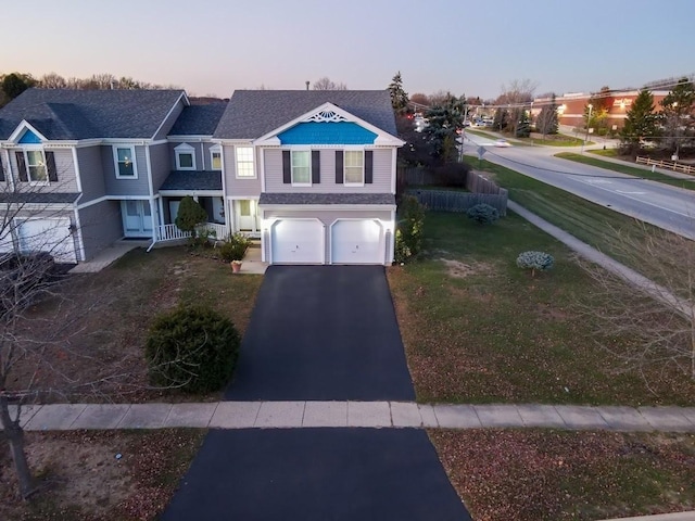 510 Orchards Pass, Bartlett, IL 60103 - view of front of property featuring driveway, an attached garage, a lawn, and a shingled roof