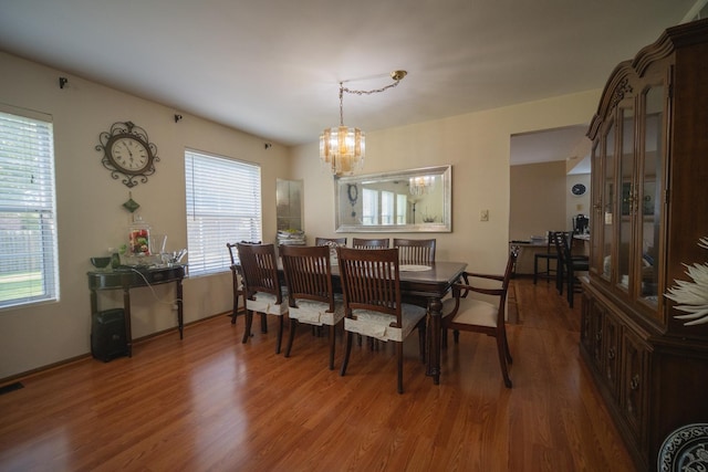 510 Orchards Pass, Bartlett, IL 60103 - dining room with a chandelier and wood finished floors