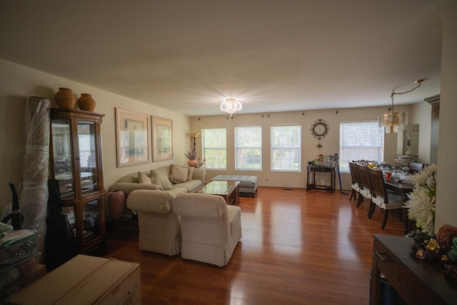 510 Orchards Pass, Bartlett, IL 60103 - living room featuring a chandelier and dark wood-style flooring