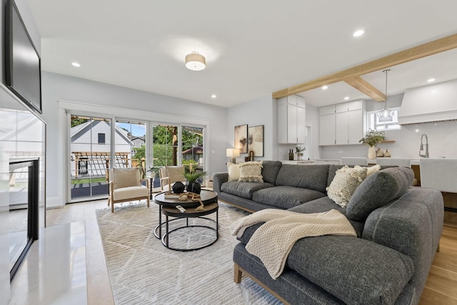 1100 Washington St, Glenview, IL 60025 - living area featuring light wood-style flooring and recessed lighting