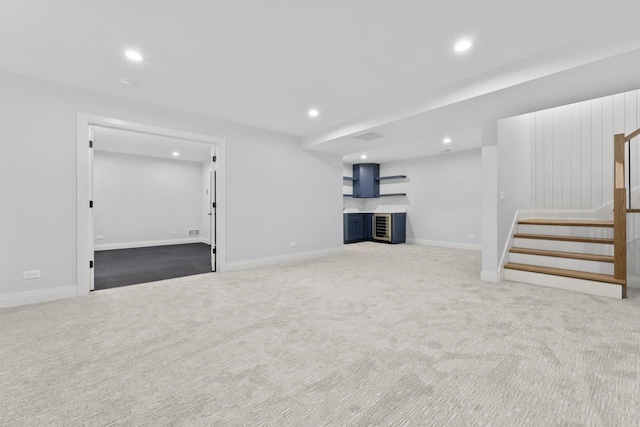 1100 Washington St, Glenview, IL 60025 - unfurnished living room with stairs, carpet floors, and recessed lighting