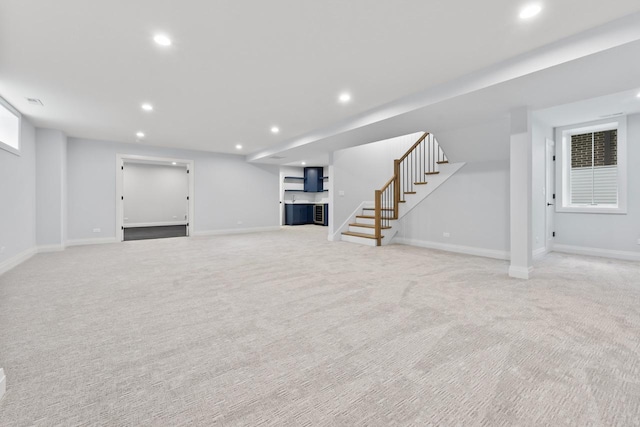 1100 Washington St, Glenview, IL 60025 - finished basement featuring stairway, light carpet, and recessed lighting