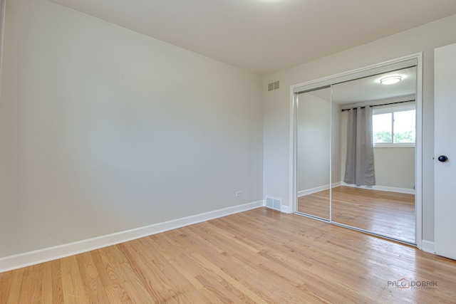 4603 Main St Unit B, Skokie, IL 60076 - unfurnished bedroom with light wood-type flooring and a closet