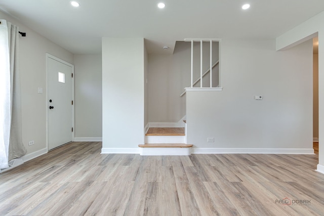 4603 Main St Unit B, Skokie, IL 60076 - empty room featuring light wood-type flooring, stairs, and recessed lighting