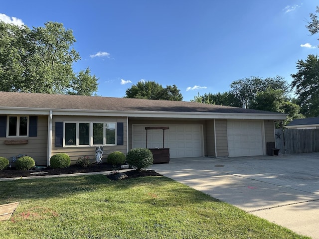 1691 Bilter Rd, Aurora, IL 60502 - ranch-style house with concrete driveway and a garage