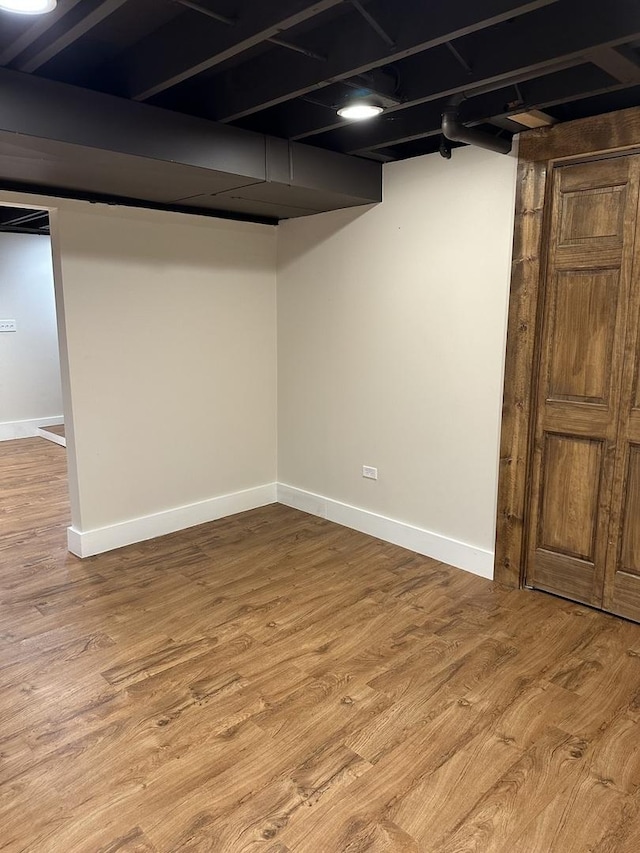 1691 Bilter Rd, Aurora, IL 60502 - finished basement with wood finished floors and baseboards