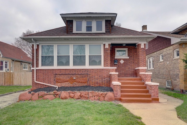 1825 S 8th Ave, Maywood, IL 60153 - view of front facade featuring brick siding and a shingled roof