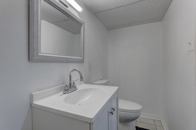 1825 S 8th Ave, Maywood, IL 60153 - bathroom featuring vanity, tile patterned floors, and a drop ceiling