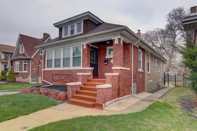 1825 S 8th Ave, Maywood, IL 60153 - bungalow-style home featuring brick siding and a chimney