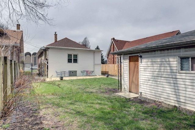 1825 S 8th Ave, Maywood, IL 60153 - fenced backyard featuring a patio area