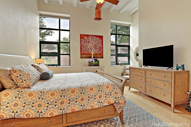 110 N 2nd St Unit 4, West Dundee, IL 60118 - bedroom featuring beamed ceiling, wood finished floors, and a ceiling fan