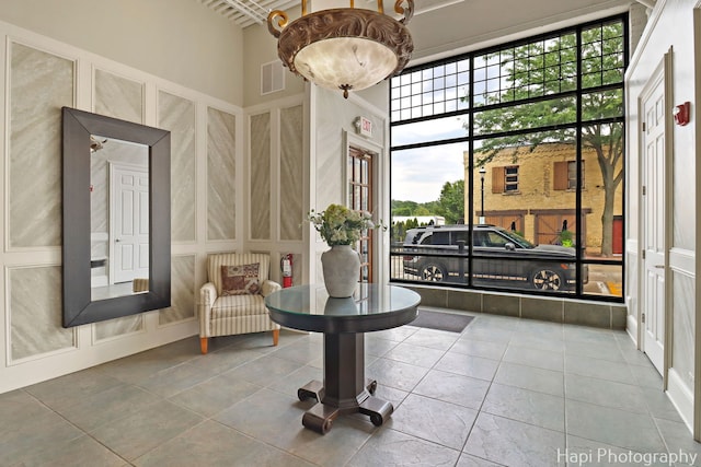 110 N 2nd St Unit 4, West Dundee, IL 60118 - common area with a decorative wall and a high ceiling