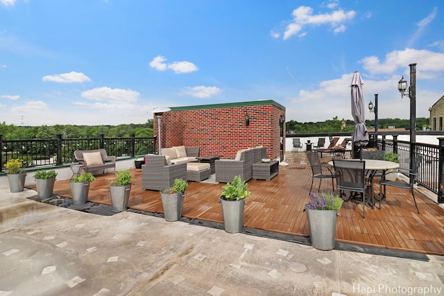 110 N 2nd St Unit 4, West Dundee, IL 60118 - wooden deck featuring an outdoor living space and outdoor dining area
