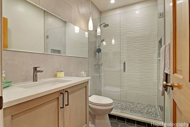 110 N 2nd St Unit 4, West Dundee, IL 60118 - bathroom featuring tile walls, vanity, a shower stall, backsplash, and recessed lighting