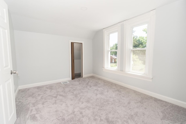328 Silver St, Elgin, IL 60123 - unfurnished bedroom featuring lofted ceiling and carpet floors