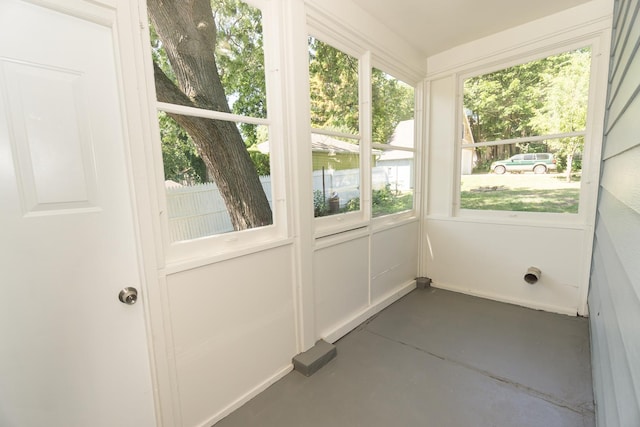 328 Silver St, Elgin, IL 60123 - unfurnished sunroom with concrete floors and plenty of natural light