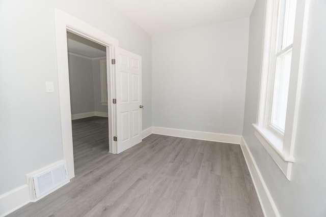 328 Silver St, Elgin, IL 60123 - unfurnished room featuring wood finished floors and baseboards
