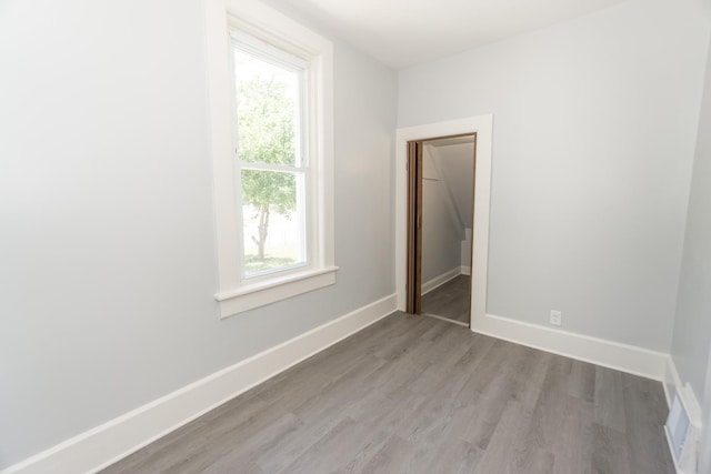 328 Silver St, Elgin, IL 60123 - empty room featuring wood finished floors and baseboards