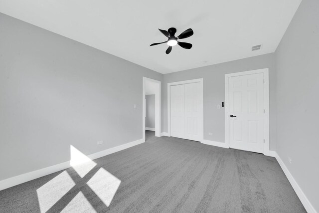 2613 Kenilworth Ave, Berwyn, IL 60402 - unfurnished bedroom featuring carpet, a closet, and ceiling fan