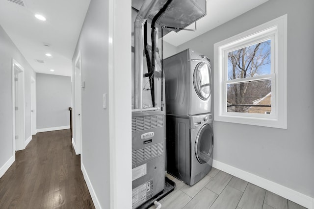 2613 Kenilworth Ave, Berwyn, IL 60402 - laundry room with stacked washer and clothes dryer and recessed lighting