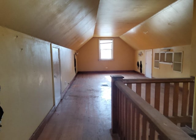 15734 Marshfield Ave, Harvey, IL 60426 - additional living space with lofted ceiling and light wood-type flooring