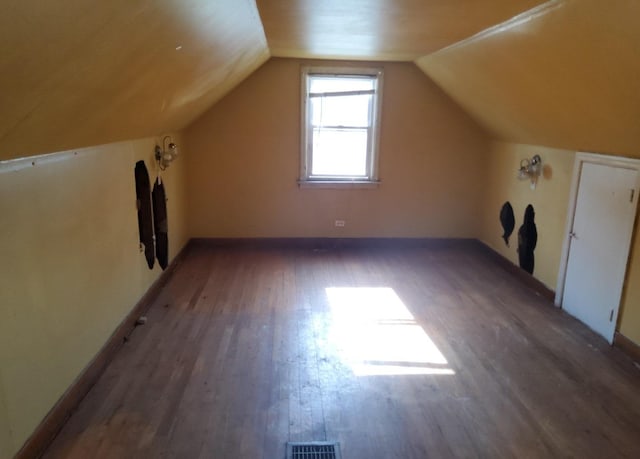 15734 Marshfield Ave, Harvey, IL 60426 - bonus room featuring wood finished floors and lofted ceiling