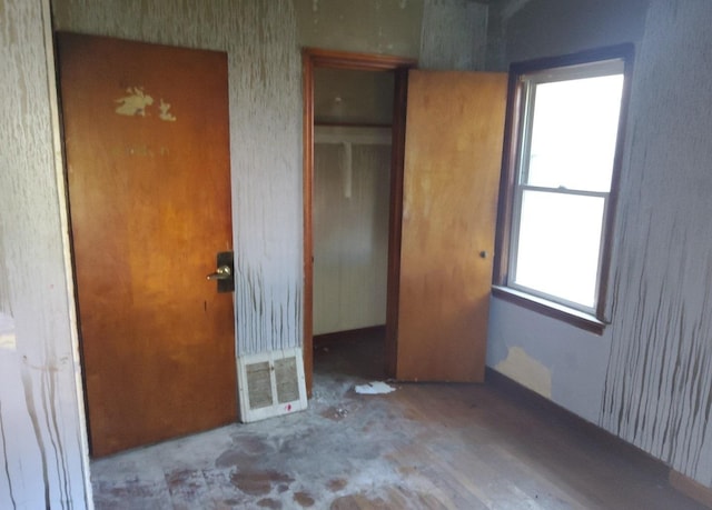 15734 Marshfield Ave, Harvey, IL 60426 - unfurnished bedroom featuring a closet