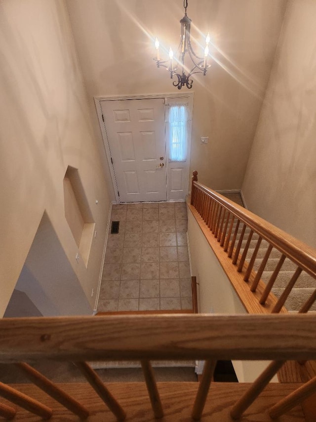 247 Lillian Ct, Geneva, IL 60134 - foyer entrance with a chandelier and stairway