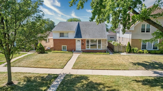 5051 Wright Ter, Skokie, IL 60077 - view of front of house featuring brick siding and a shingled roof